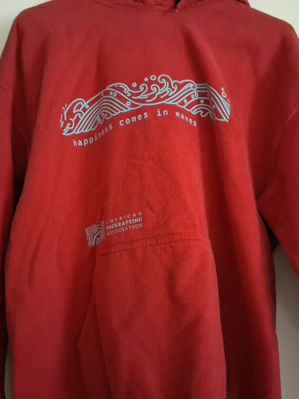 Red Hoodie - "Happiness Comes in Waves"
